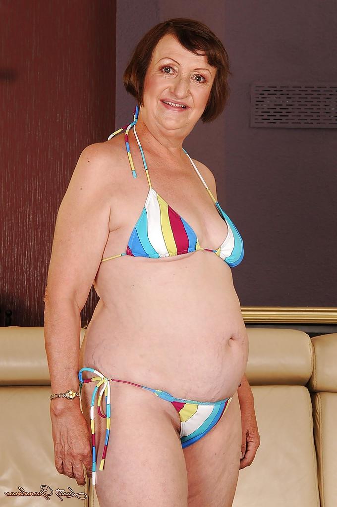 16P Fatty granny with tiny tits Eve Tickler taking off her bikini