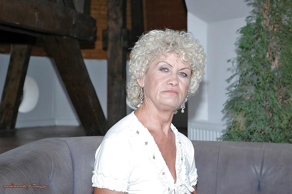 16P Filthy granny in stockings stripping and toying her hairy cunt