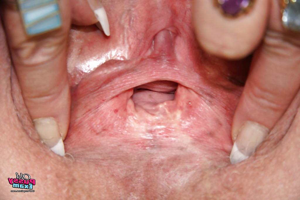 16P Horny granny playing with her huge flabby tits and toying her shaved cunt