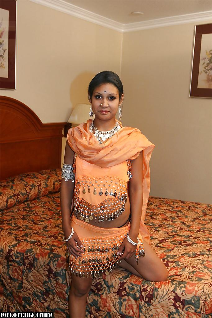 16P Naughty indian lady on high heels uncovering her tits and pussy