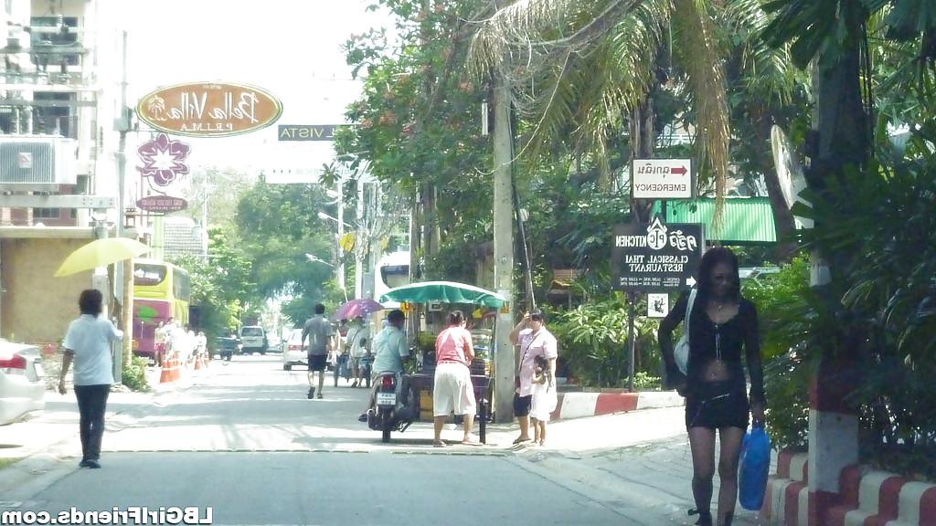 16P Cute and gorgeous Thai shemales posing outdoors in skirts and dresses