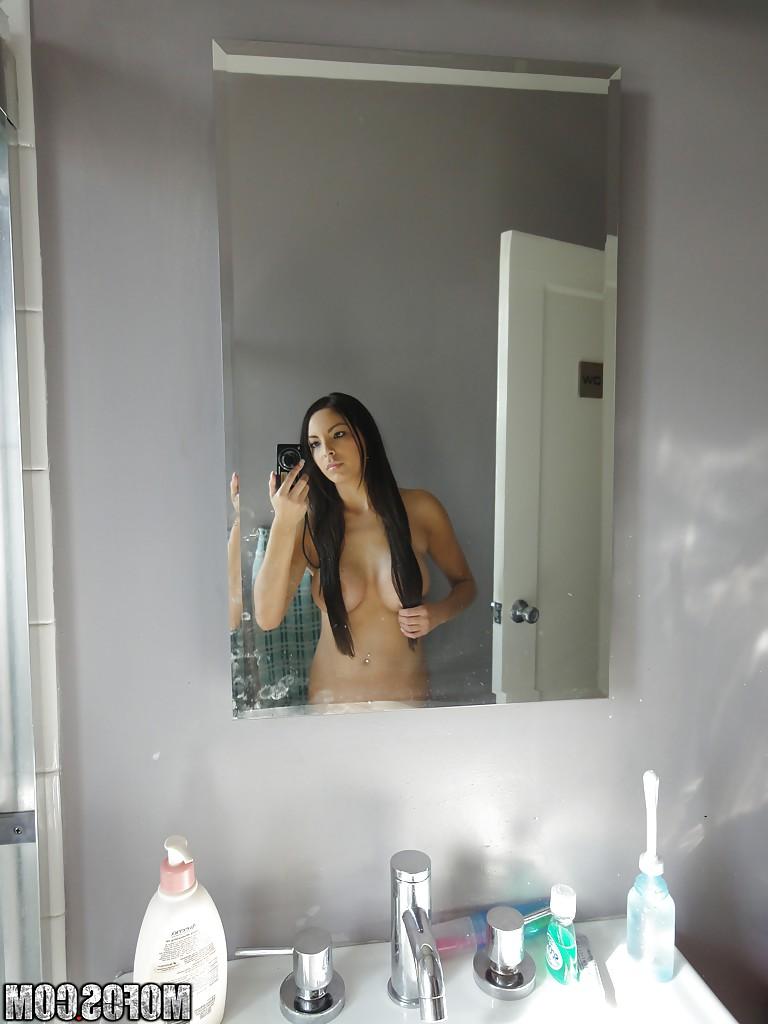 16P Latina brunette Danni Cole dose self shots while naked in the bathroom