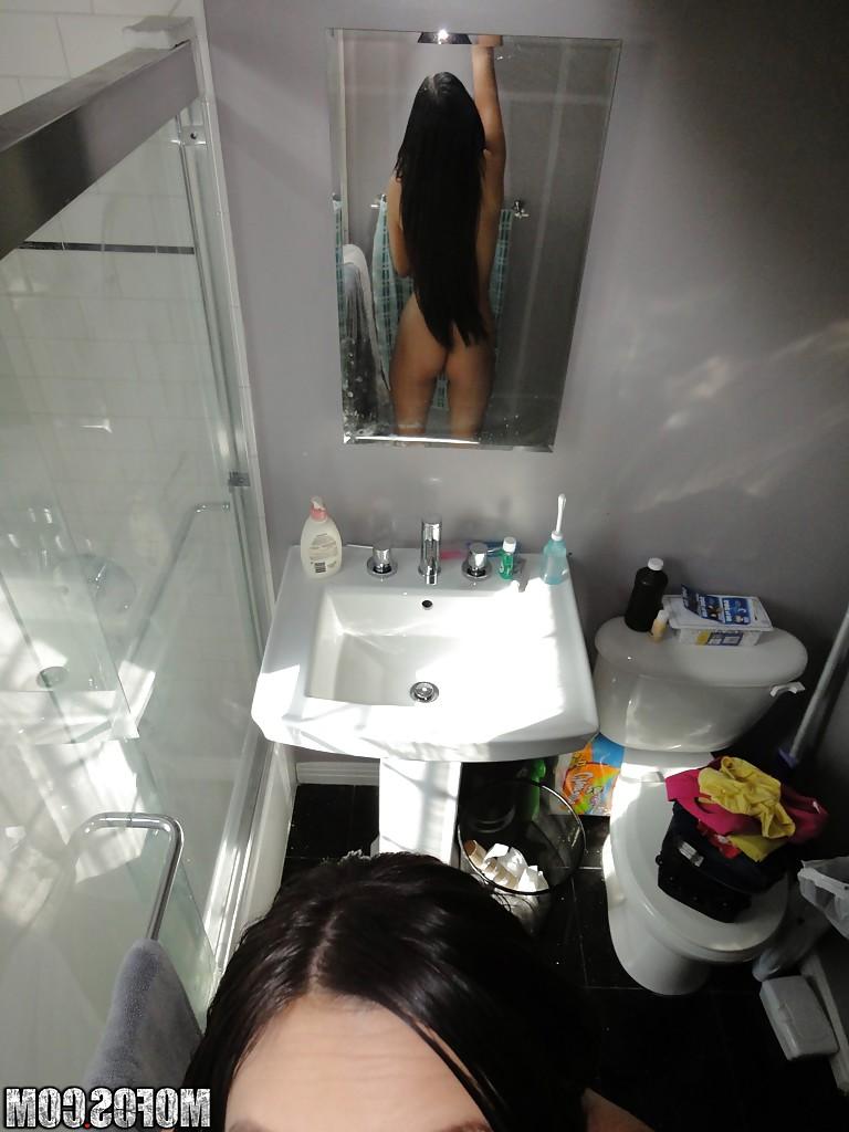 16P Latina brunette Danni Cole dose self shots while naked in the bathroom