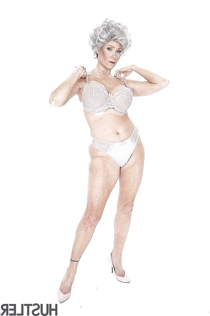 16P Granny pornstar Darla Crane stripping down to bra and underwear