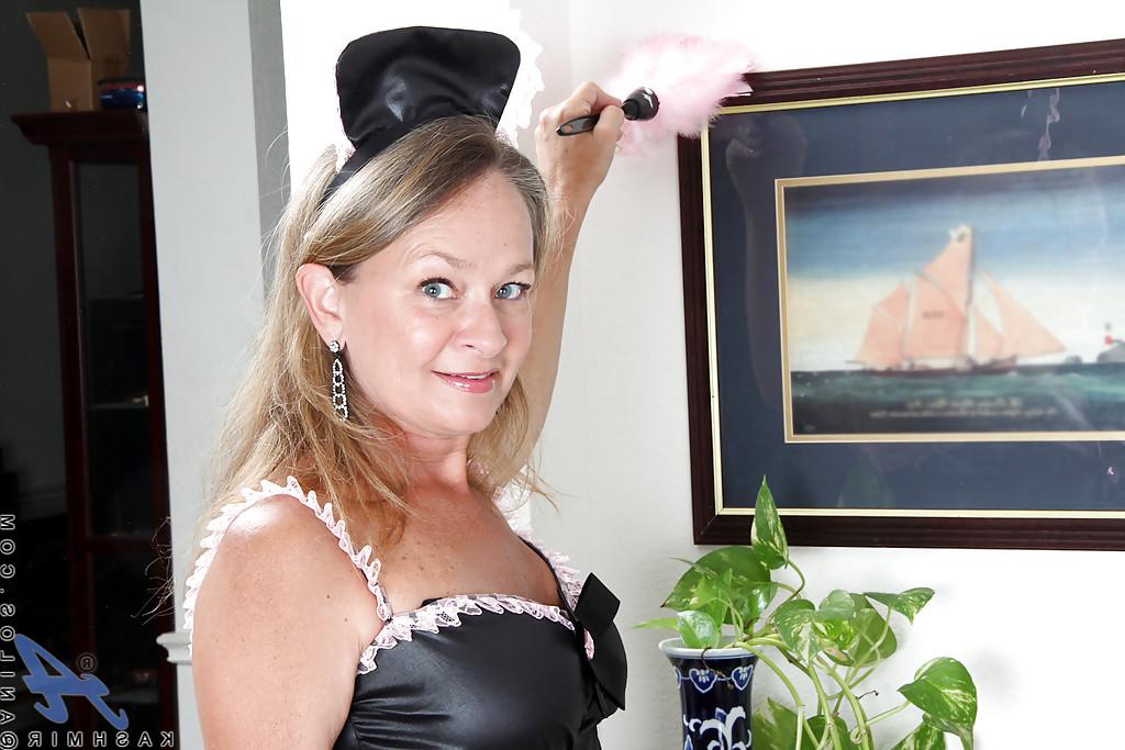 16P Frisky mature maid in sexy uniform pleasing her cunt with a vibrator