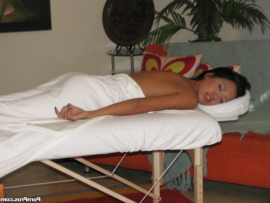 10P Brunette girl Amia Miley peeling off shorts before climbing aboard massage bed