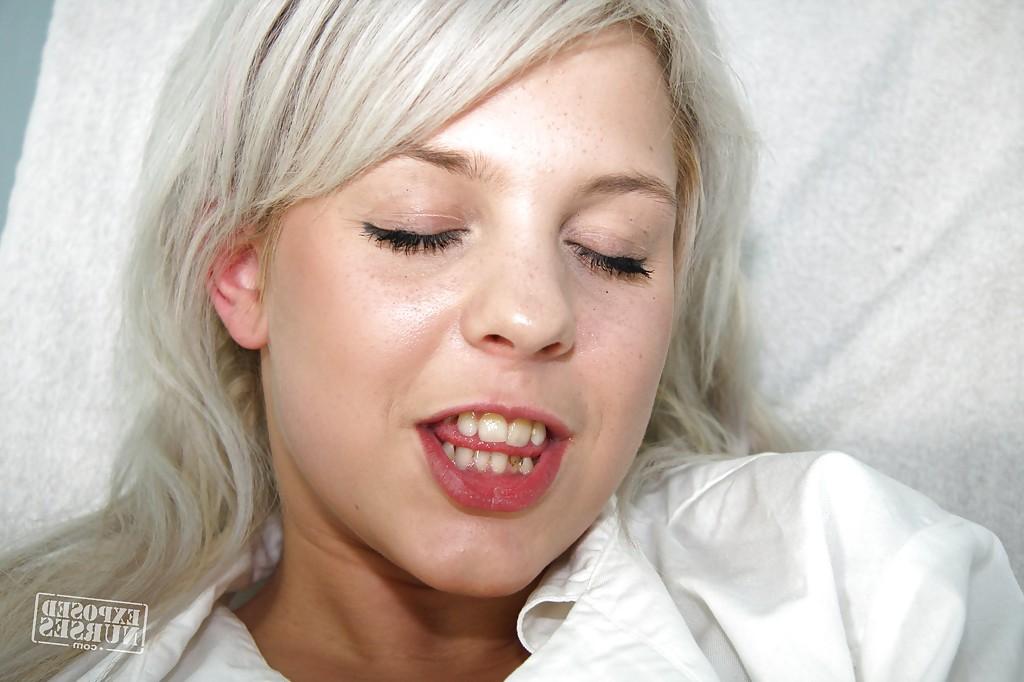 16P Horny babe in a nurse outfit Kristina Rud showing her wet cunt