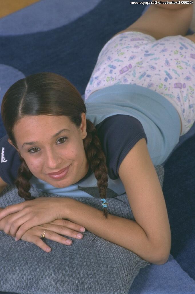 16P Pigtailed brunette with teen face Janay is showing off her little tits