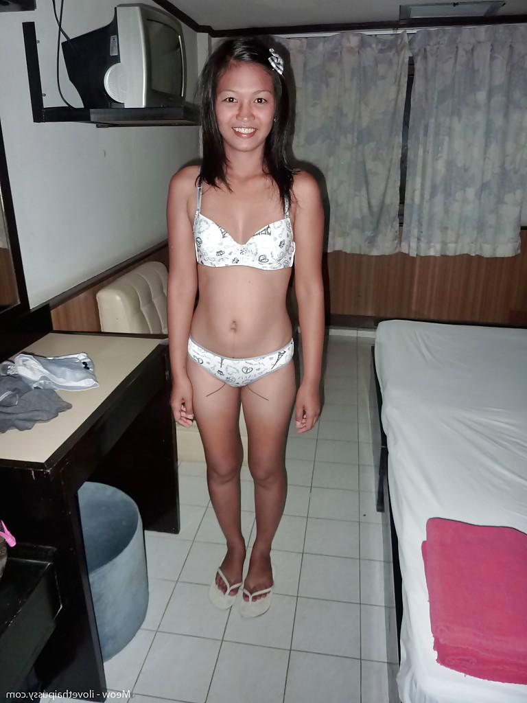 13P Thai solo girl Meow showing off tattooed twat and back before peeing in toilet