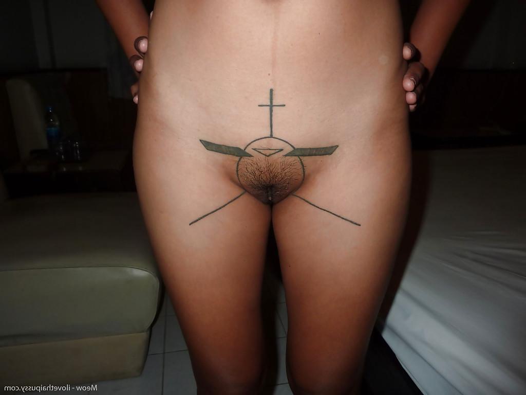 13P Thai solo girl Meow showing off tattooed twat and back before peeing in toilet