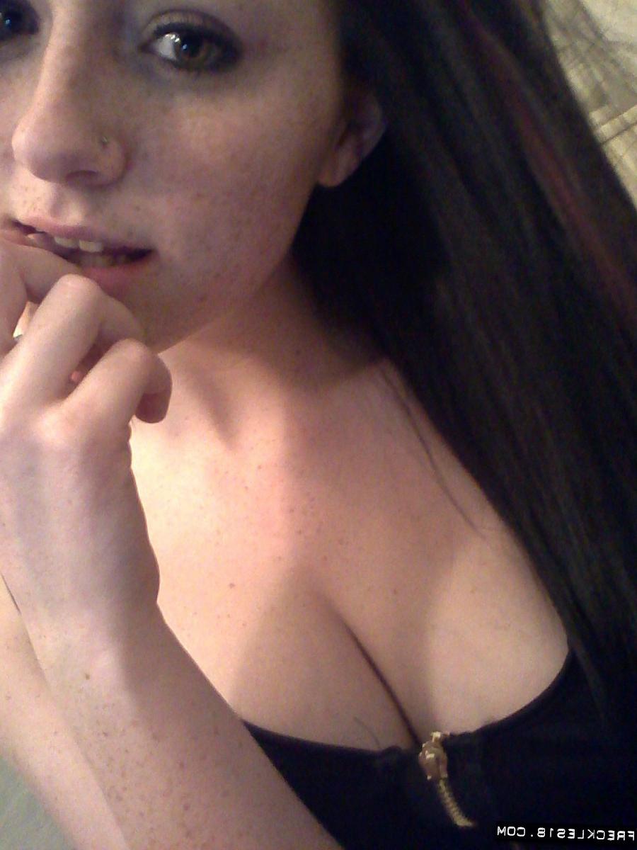 12P Self shot of hot teen amateur Freckles toying big tits with dildo