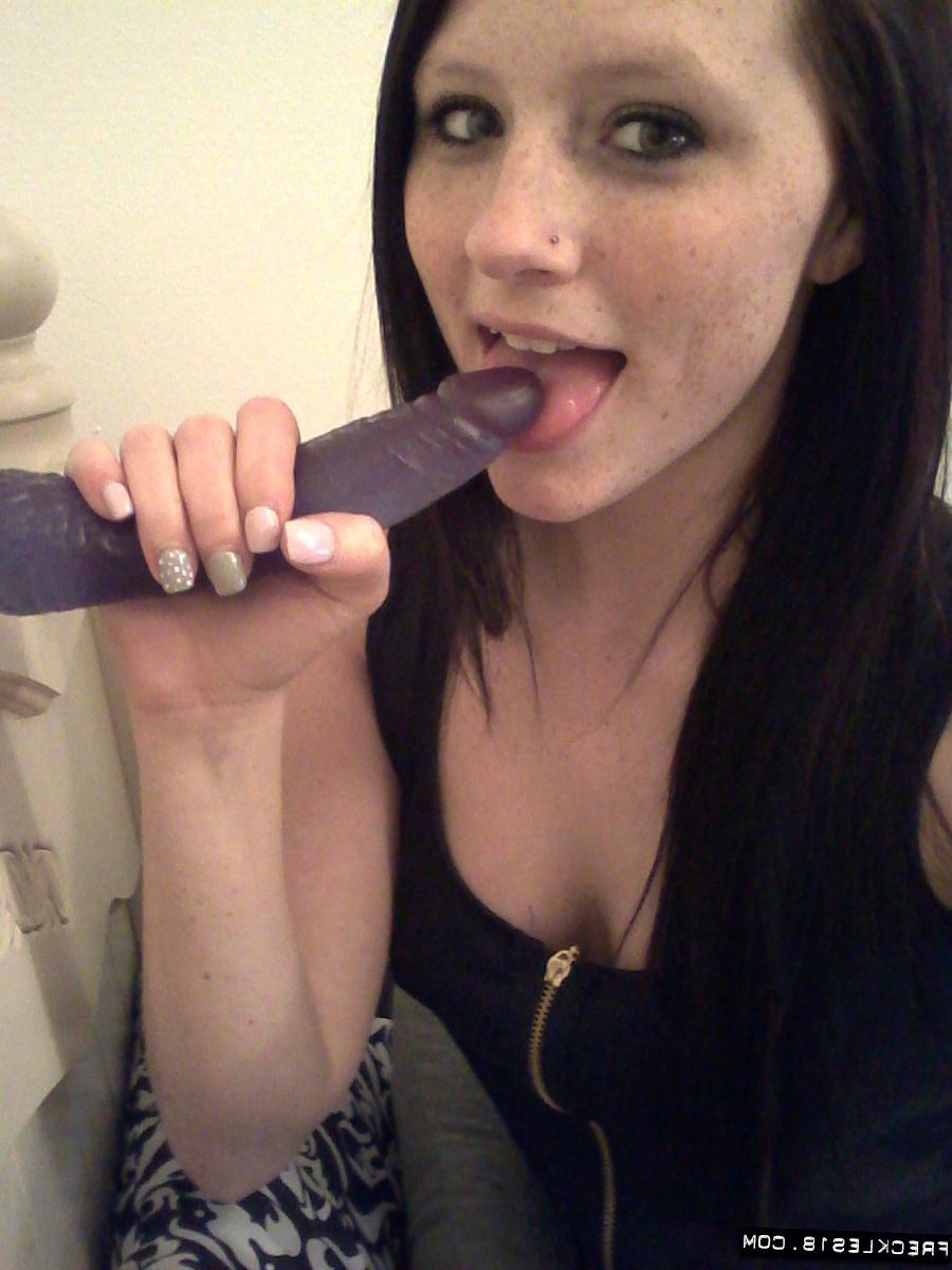 12P Self shot of hot teen amateur Freckles toying big tits with dildo