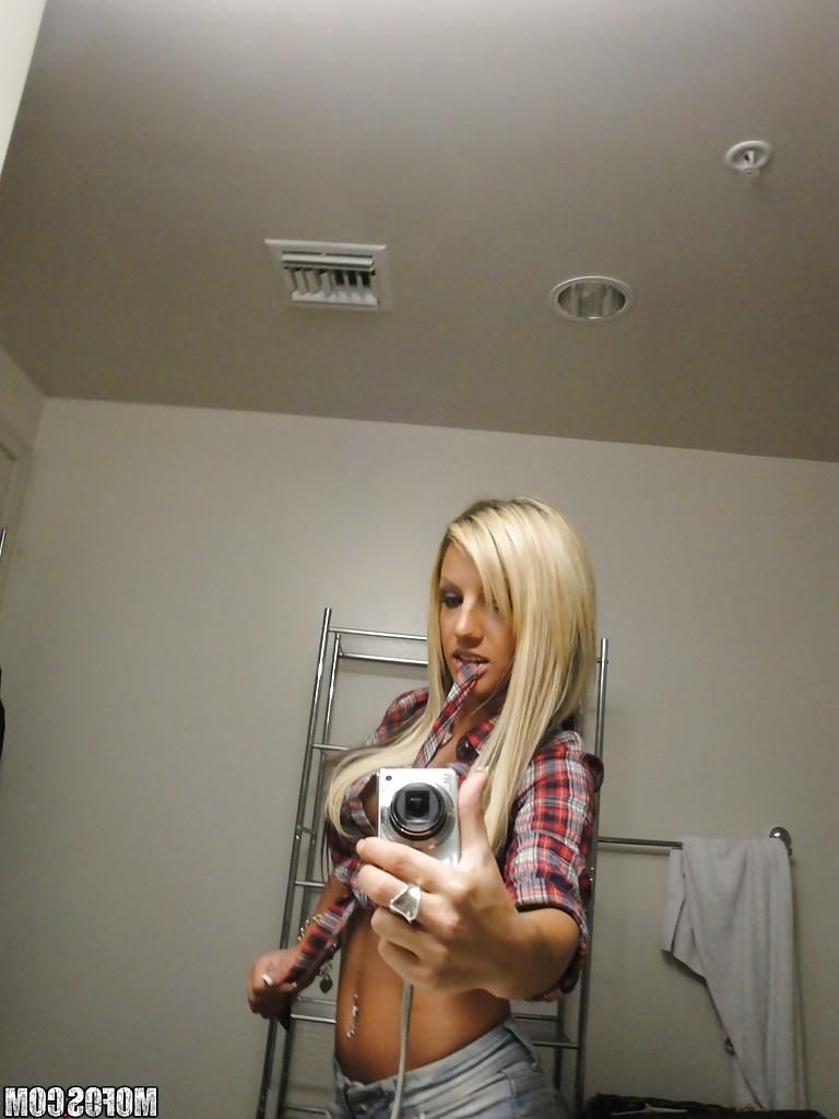 13P Perky blondie with piercing undressing and making selfies in the bath