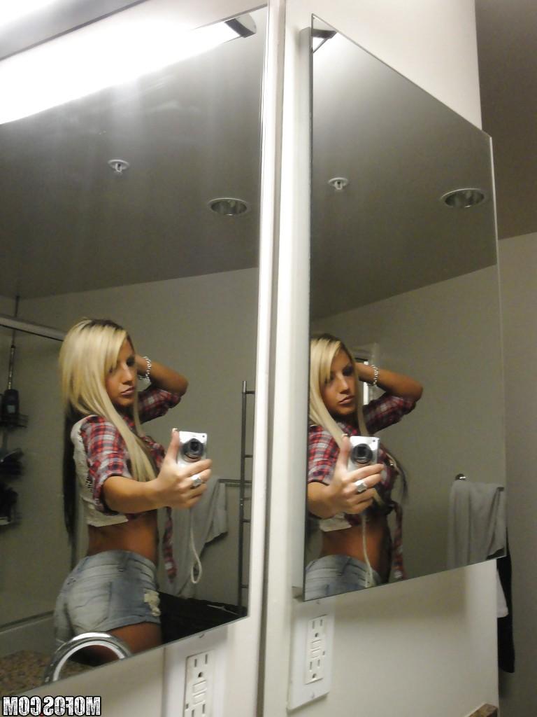 13P Perky blondie with piercing undressing and making selfies in the bath