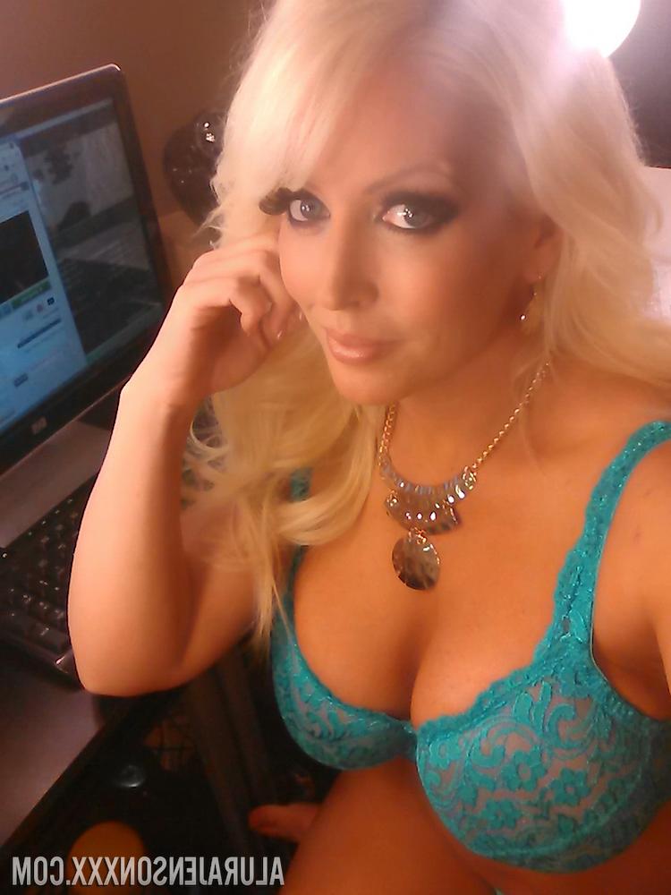 12P Platinum blonde bombshell Alura Jenson baring big tits for selfie
