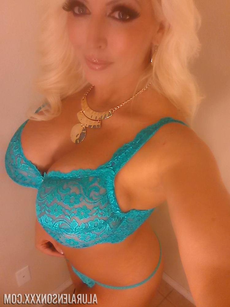 12P Platinum blonde bombshell Alura Jenson baring big tits for selfie