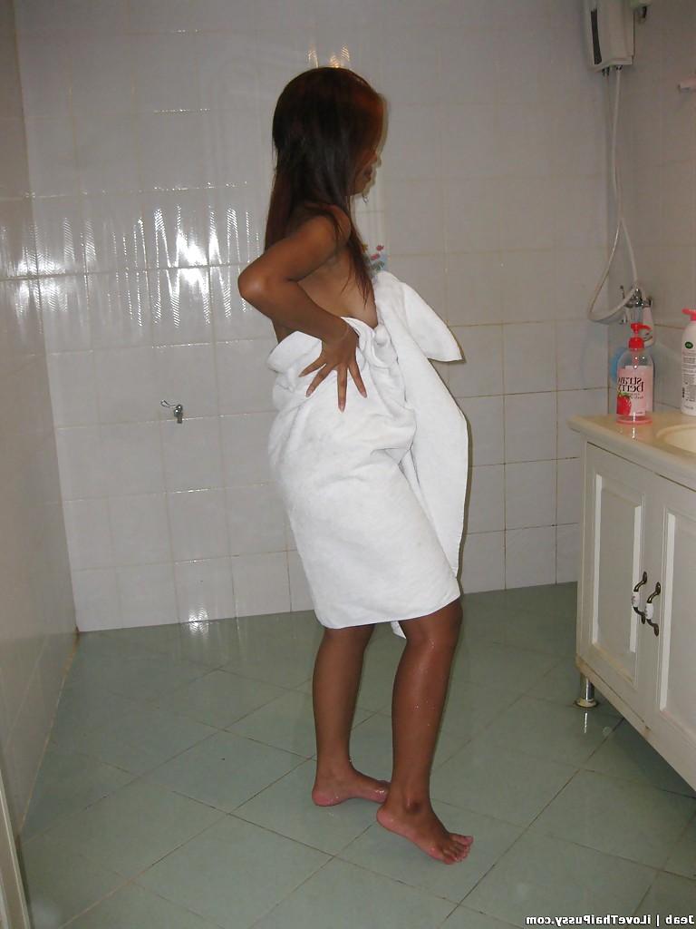 16P Slutty asian teen babe taking a shower and getting her shaved cunt drilled