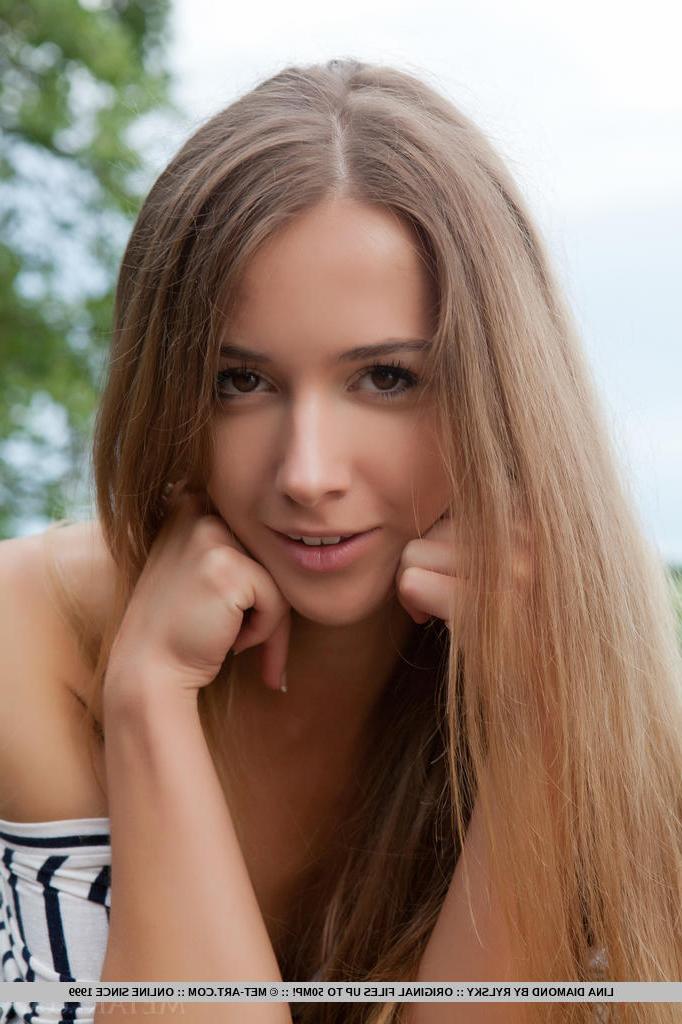 18P Euro babe with beautiful teen face and spread legs displaying shaved pussy