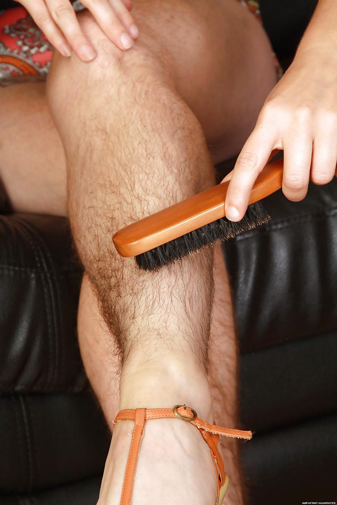16P Mature redhead babe Velma caresses her very hairy cunt with comb