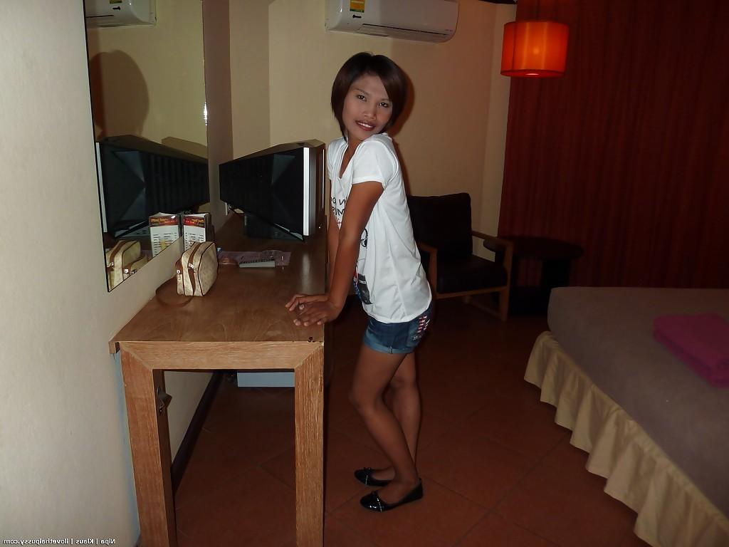 16P Asian cutie taking off her clothes and showcasing her fuckable body