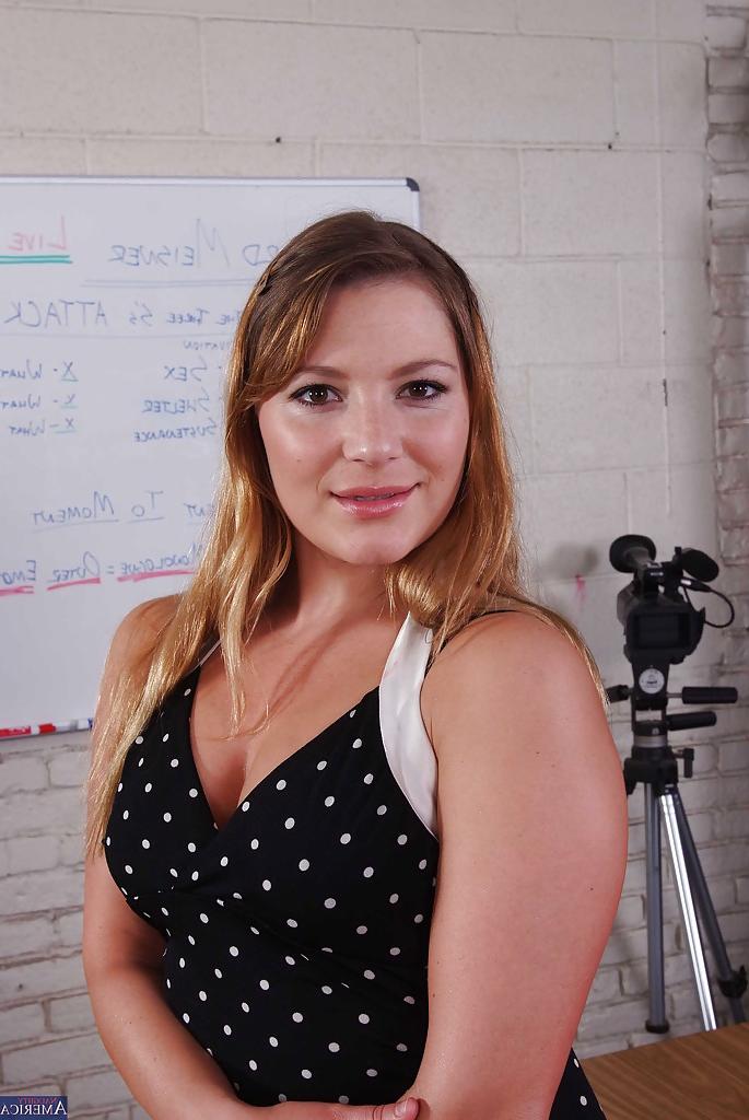16P Milf teacher Aurora Snow teases her big tits in a sexy stockings