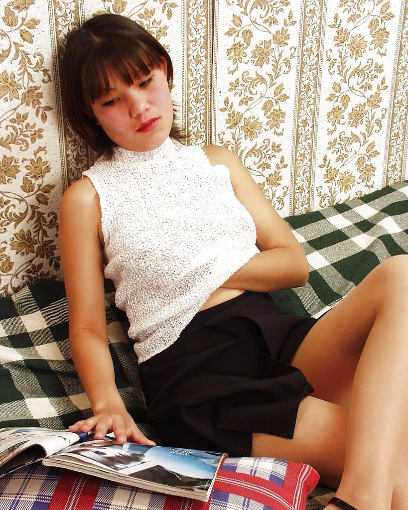 16P Horny thai floosie teasing her hungry cunt through her pantyhose