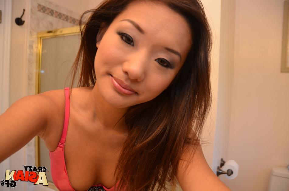 16P Skinny Asian babe Alina Li taking self shot bikini pics in shower