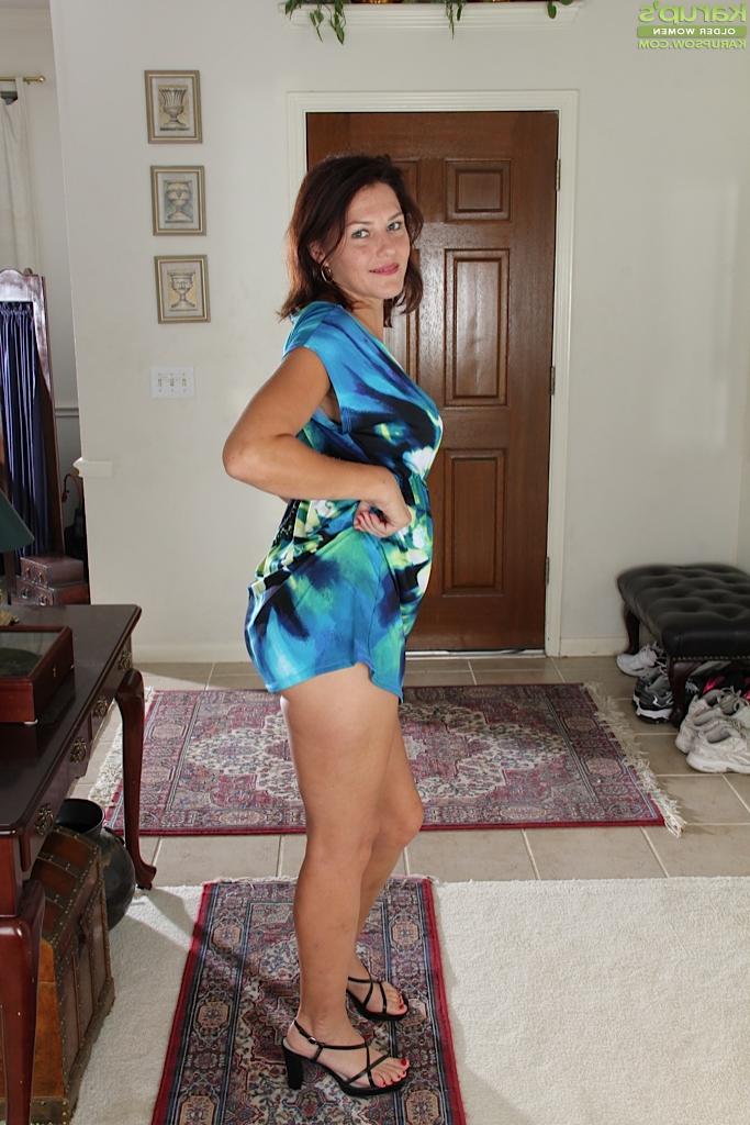 16P Clothed milf brunette with big tits Ava Austin is teasing herself