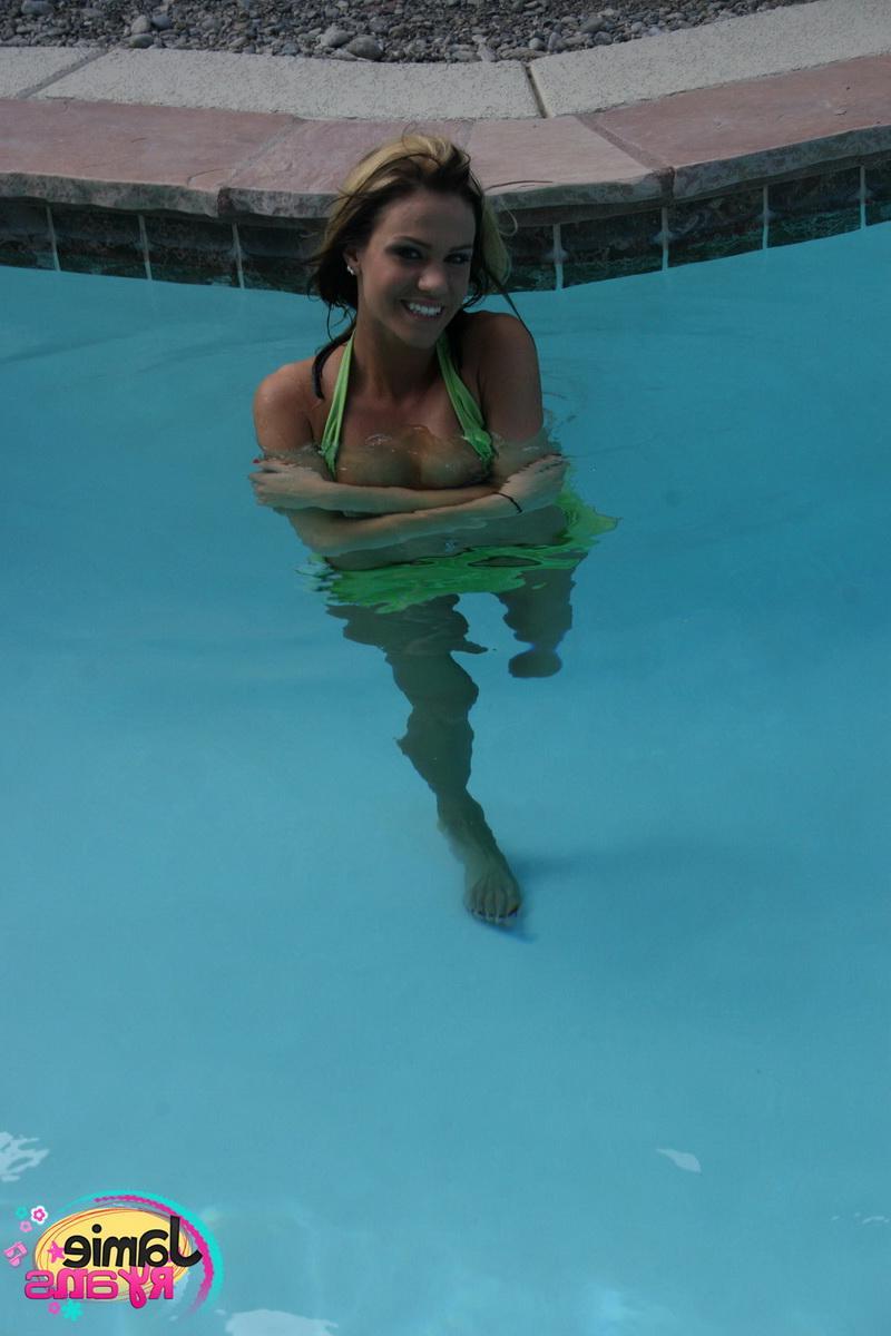 12P Hot teen Jamie Ryans flashes her perky tits while at the pool in her bikini