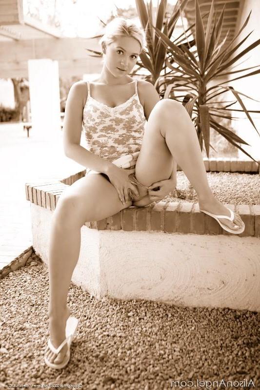16P Pictures of teen porn girl Alison Angel showing you what's up her skirt