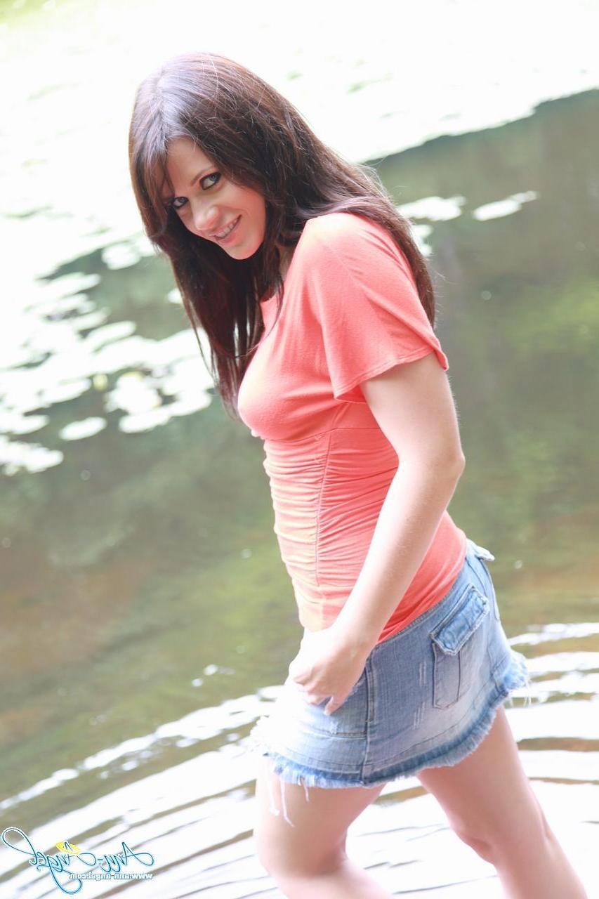 15P Pictures of brunette teen Ann Angel showing you up her skirt outside
