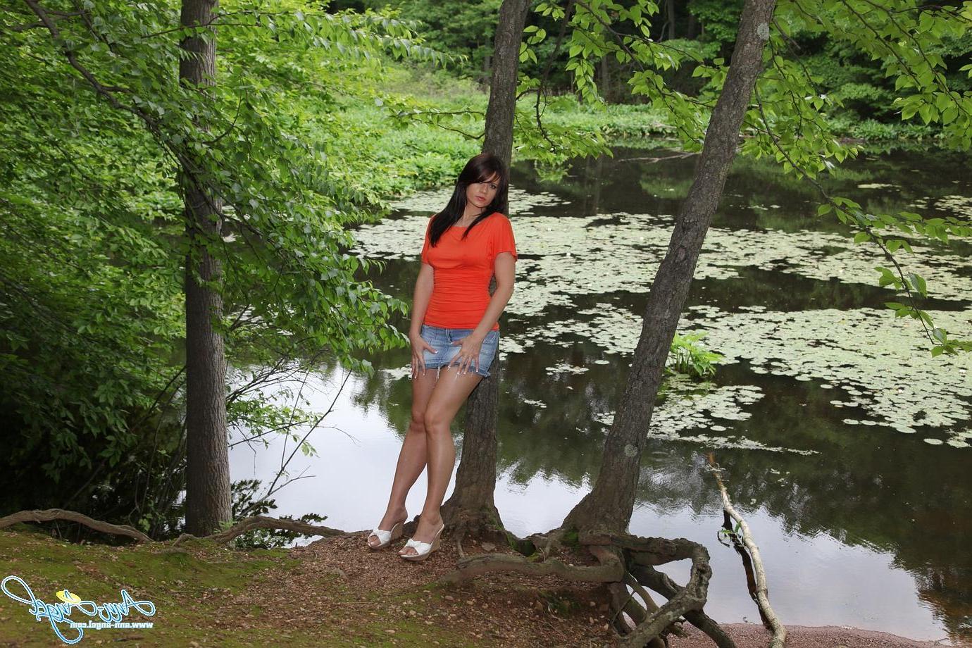 15P Pictures of brunette teen Ann Angel showing you up her skirt outside