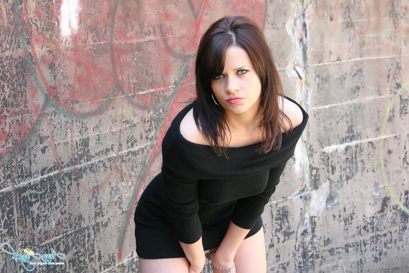 16P Pictures of Ann Angel being a cock tease outside