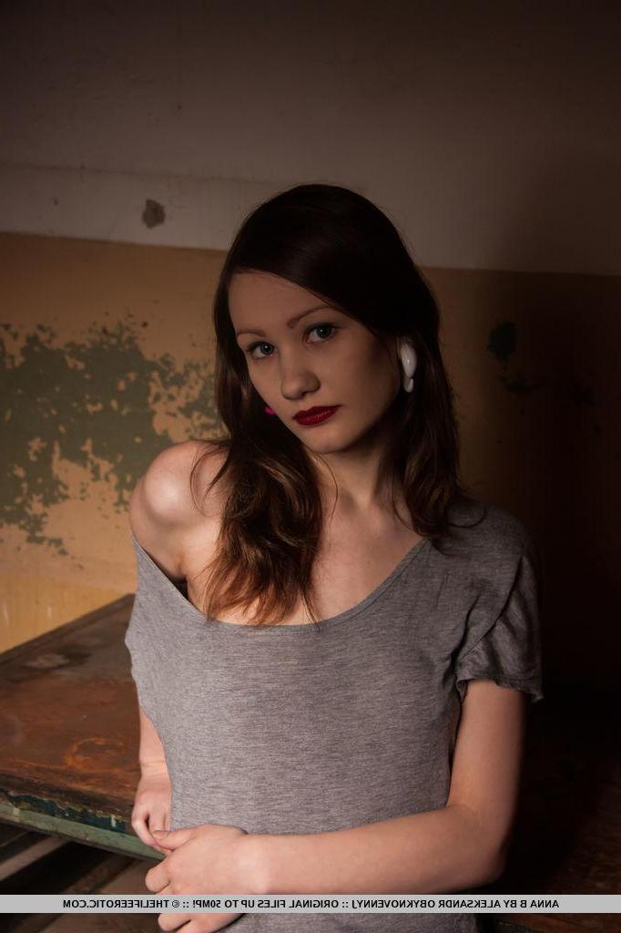 16P Goth girl Anna B strips in a grungy basement