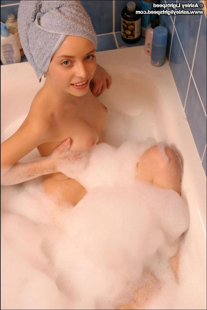 20P Pictures of a teen girl taking a bath