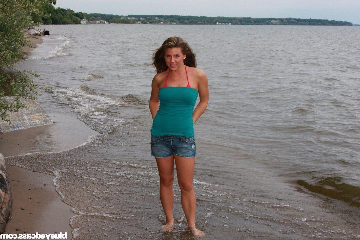 15P Pictures of Blueyed Cass getting wet on a beach