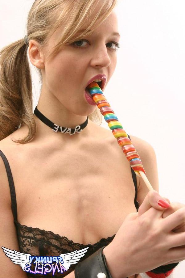 20P Pictures of schoolgirl Britney Braces licking and sucking a lollipop