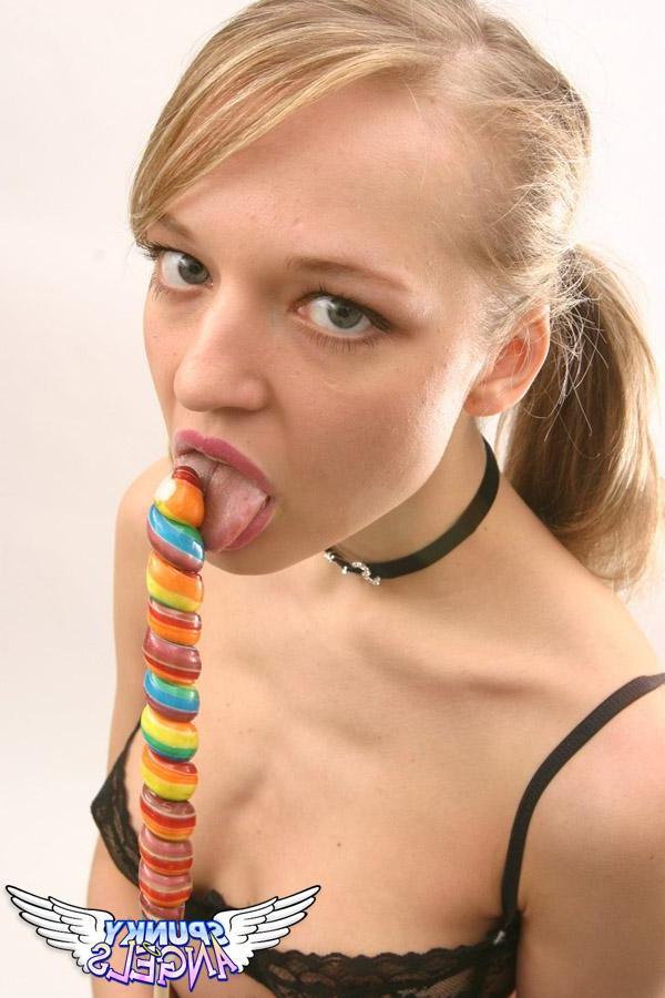 20P Pictures of schoolgirl Britney Braces licking and sucking a lollipop