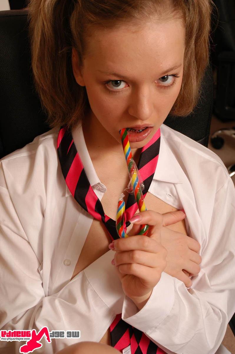 15P Pictures of schoolgirl Britney Braces getting naked in an office