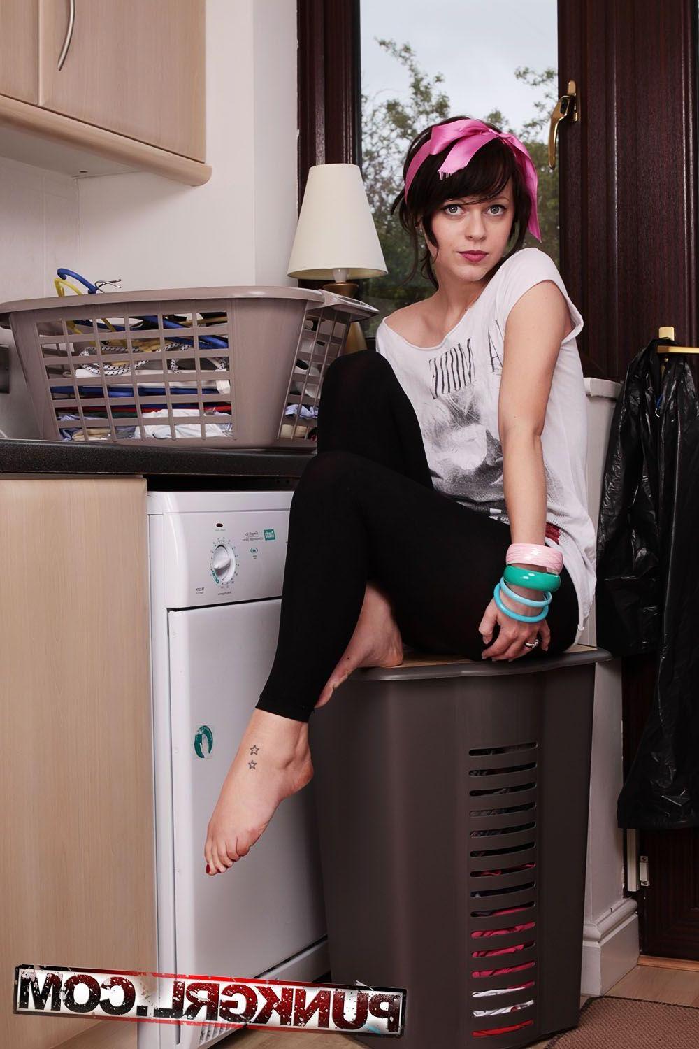 20P Pictures of Caz getting naked in the laundry room