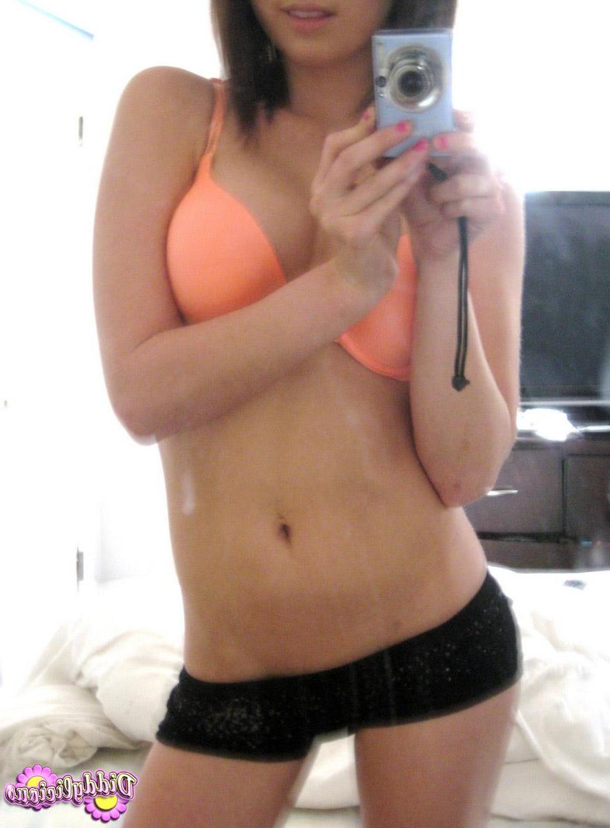 12P Diddy takes self pictures of herself in a bright orange bra