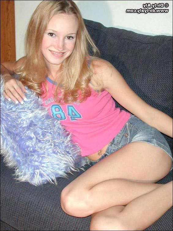 20P Pictures of teen chick Dirty Aly taking her clothes off in the living room
