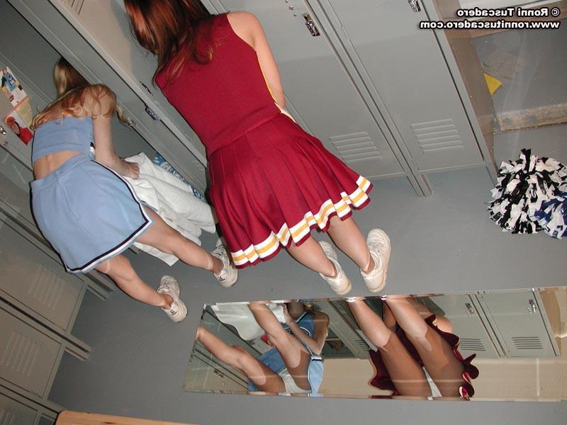 20P Two cheerleaders get changed in the locker room