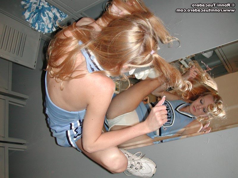 20P Two cheerleaders get changed in the locker room