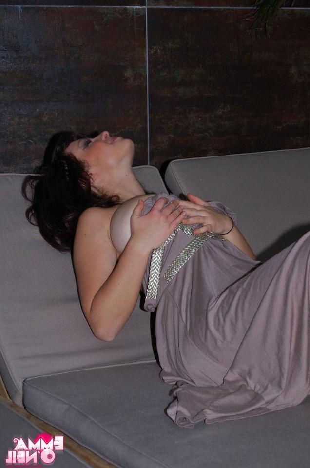 16P Pictures of teen amateur Emma O'Neil cupping her big boobies