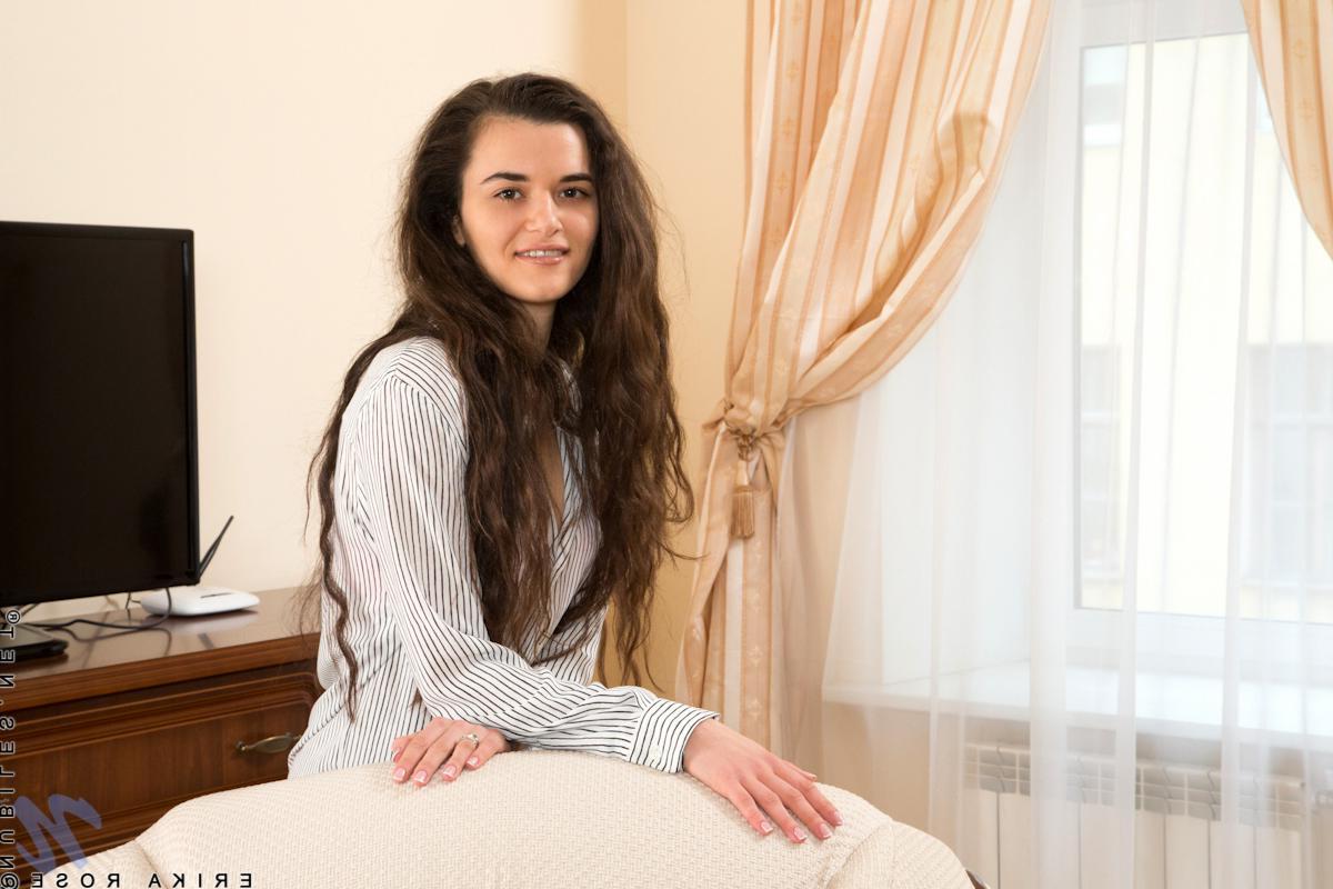 15P Long haired beauty Erika Rose spreads her tight pussy for you