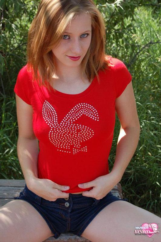 16P Pictures of teen Forever Laura showing off her tits outside