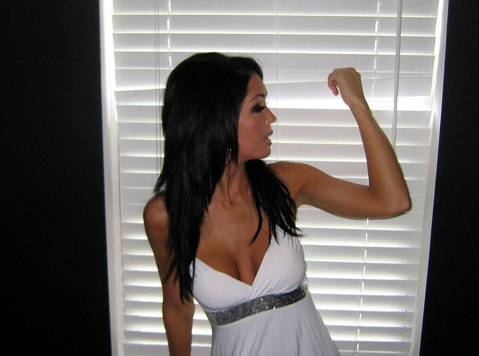 20P Pictures of Foxy Jacky showing off her tits and cunt
