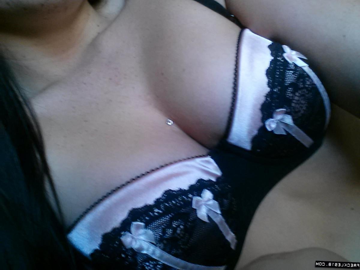 12P Brunette tease Freckles 18 poses for you on the couch in her black lingerie