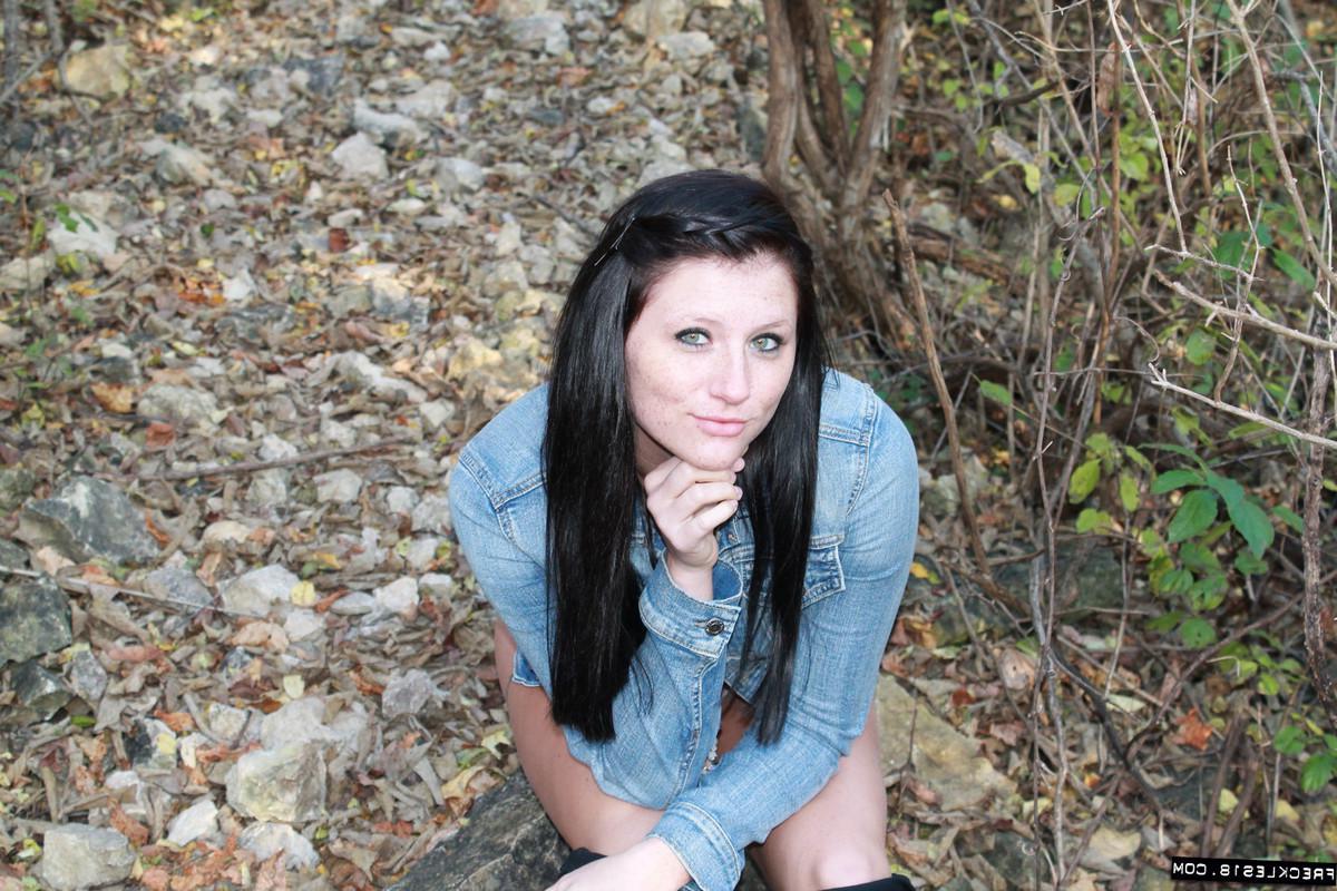 12P Brunette cutie Freckles 18 shows you her panties and bra in the woods